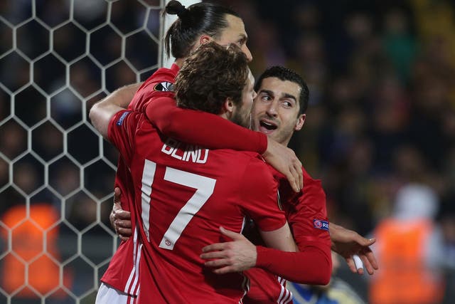 Mkhitaryan is congratulated after opening the scoring