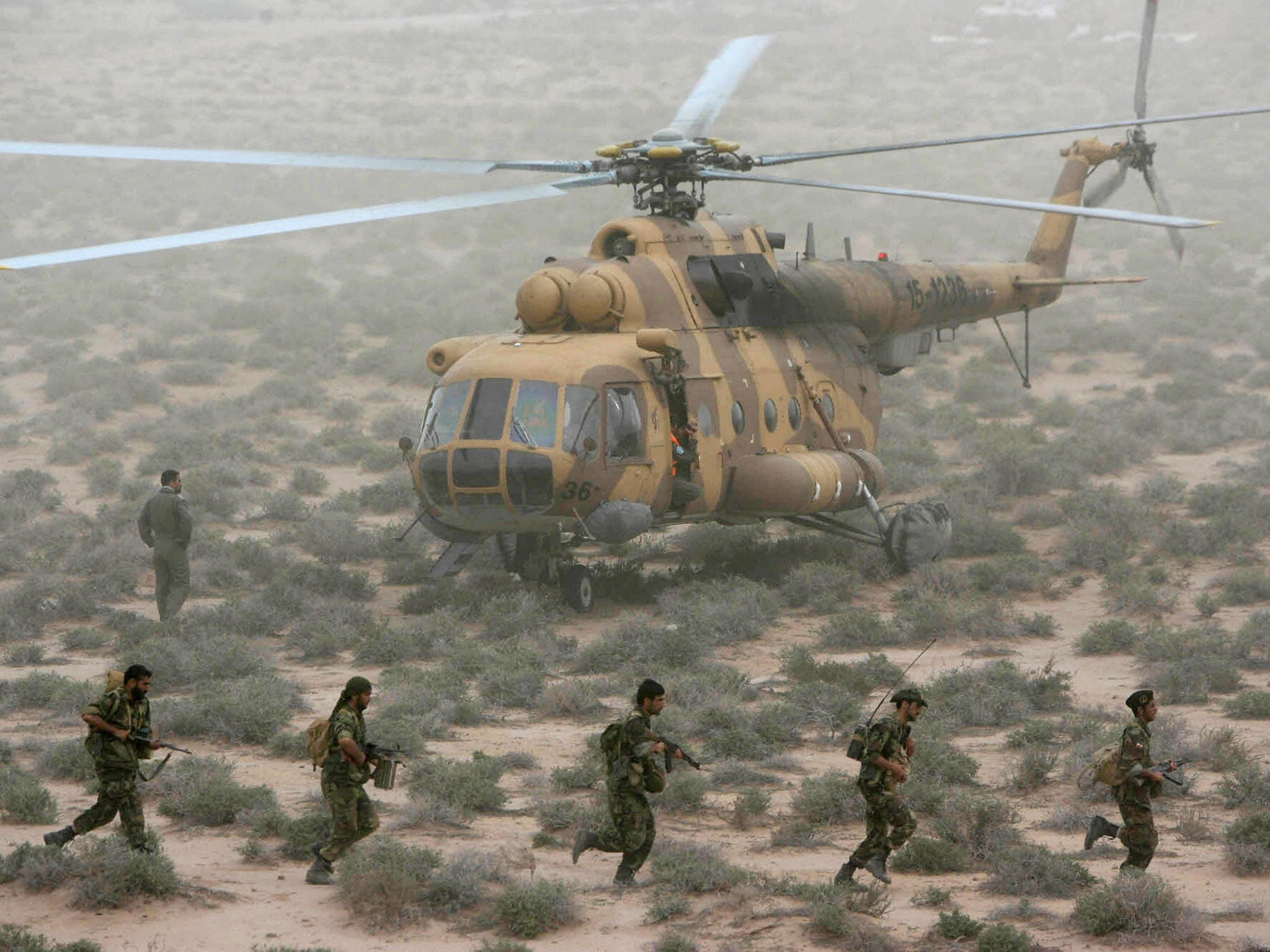 In a file picture dated 03 April 2006, Iran's elite Revolutionary Guard special forces participate in military manoeuvers at an undisclosed location near the Gulf.