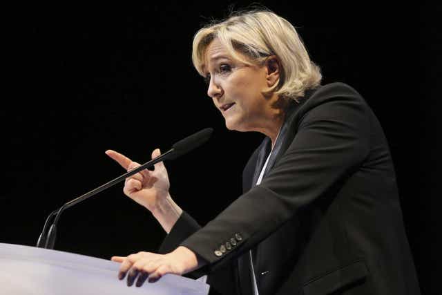 Hard-right French Nationalist presidential candidate Marine Le Pen gestures speaks during a conference in Nantes