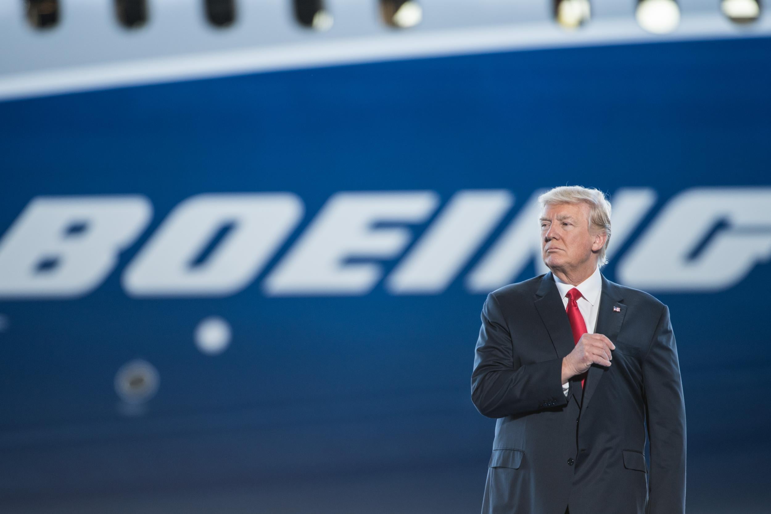 Donald Trump visiting the Boeing plant - but sometimes he might cause you a delay