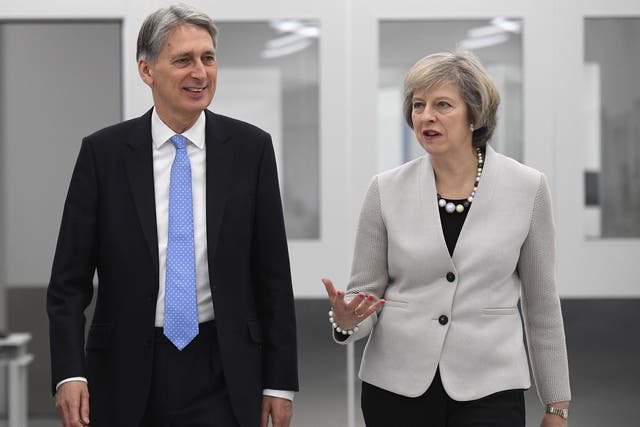 Theresa May and Philip Hammond have clashed repeatedly since the former became PM