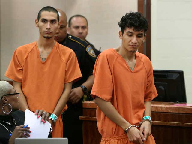 Miguel Alvarez-Flores, right, and Diego Hernandez-Rivera appear in court in Houston.The pair, who had a Satanic shrine in their Houston apartment, have been charged with killing one teenager and kidnapping another
