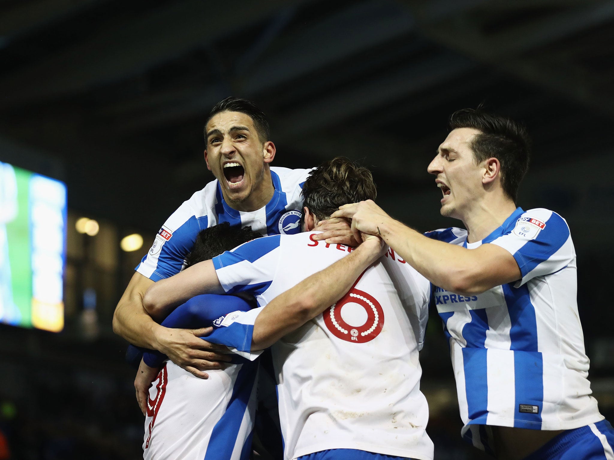 Brighton's players celebrate after Sam Baldock scored the side's second