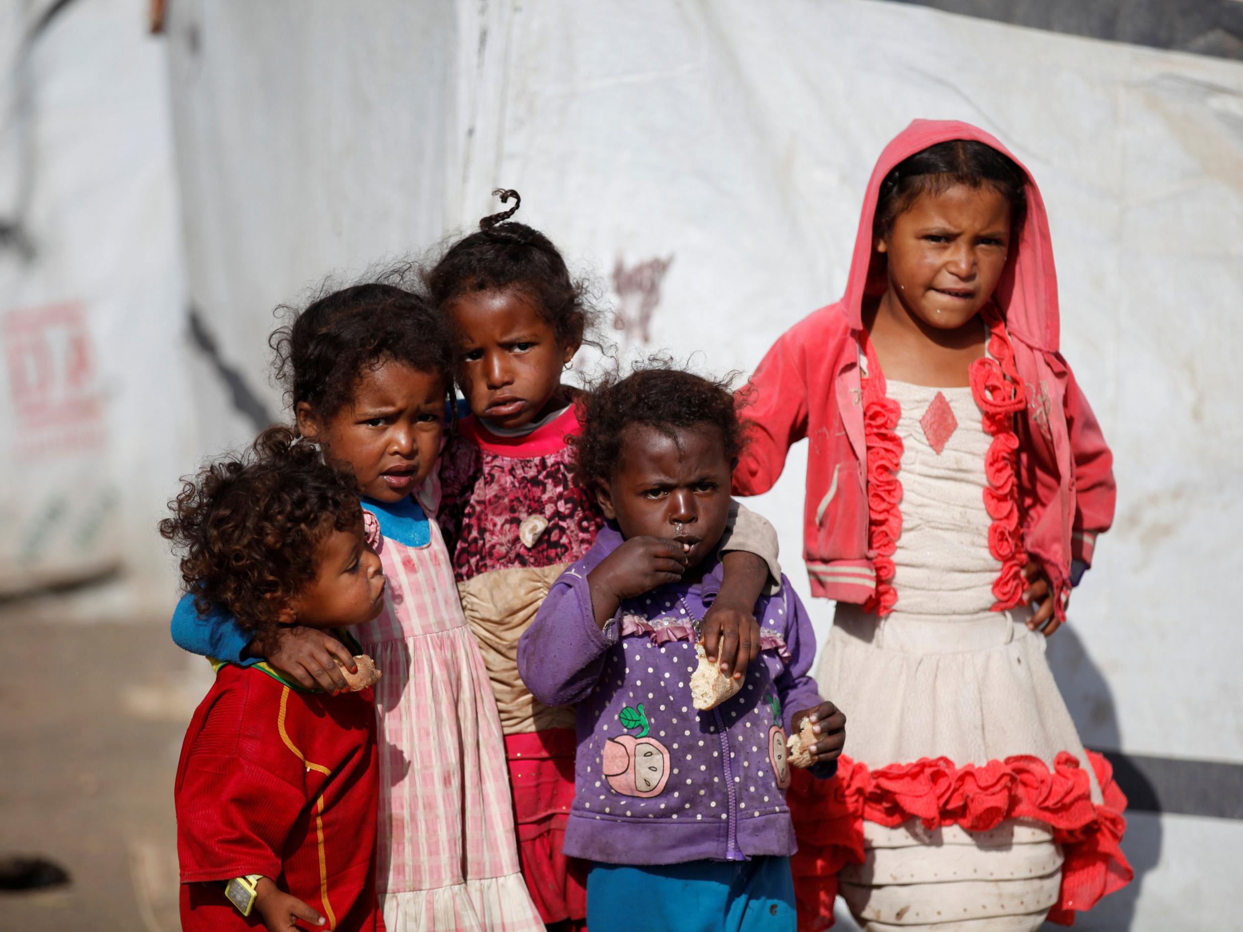 Children at a camp for displaced people in Dharawan in Yemen