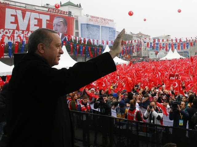 Turkish President Recep Tayyip Erdogan waves to supporters during the opening ceremony of a subway station in Istanbul, Turkey, 11 March 2017