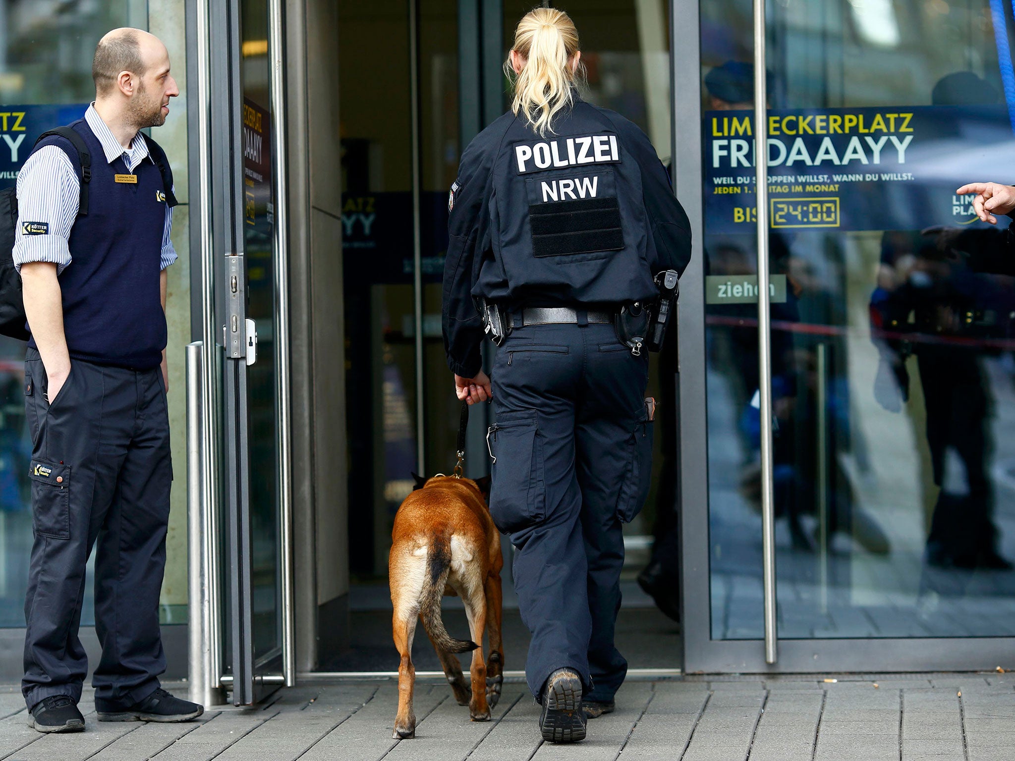 Dogs begin searching Limbecker Platz shopping mall in Essen, Germany, yesterday