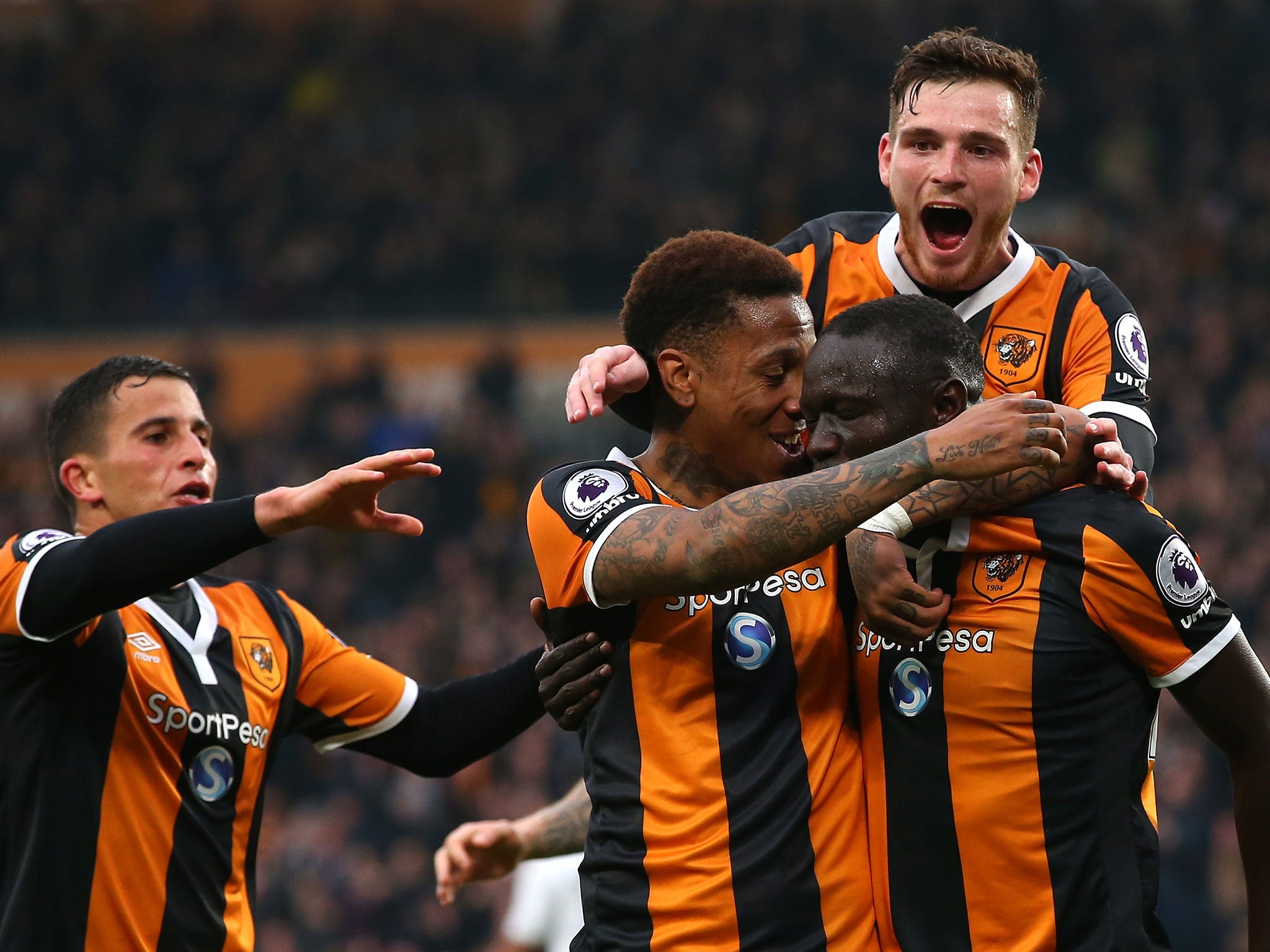 Oumar Niasse celebrates with team-mates after putting Hull ahead
