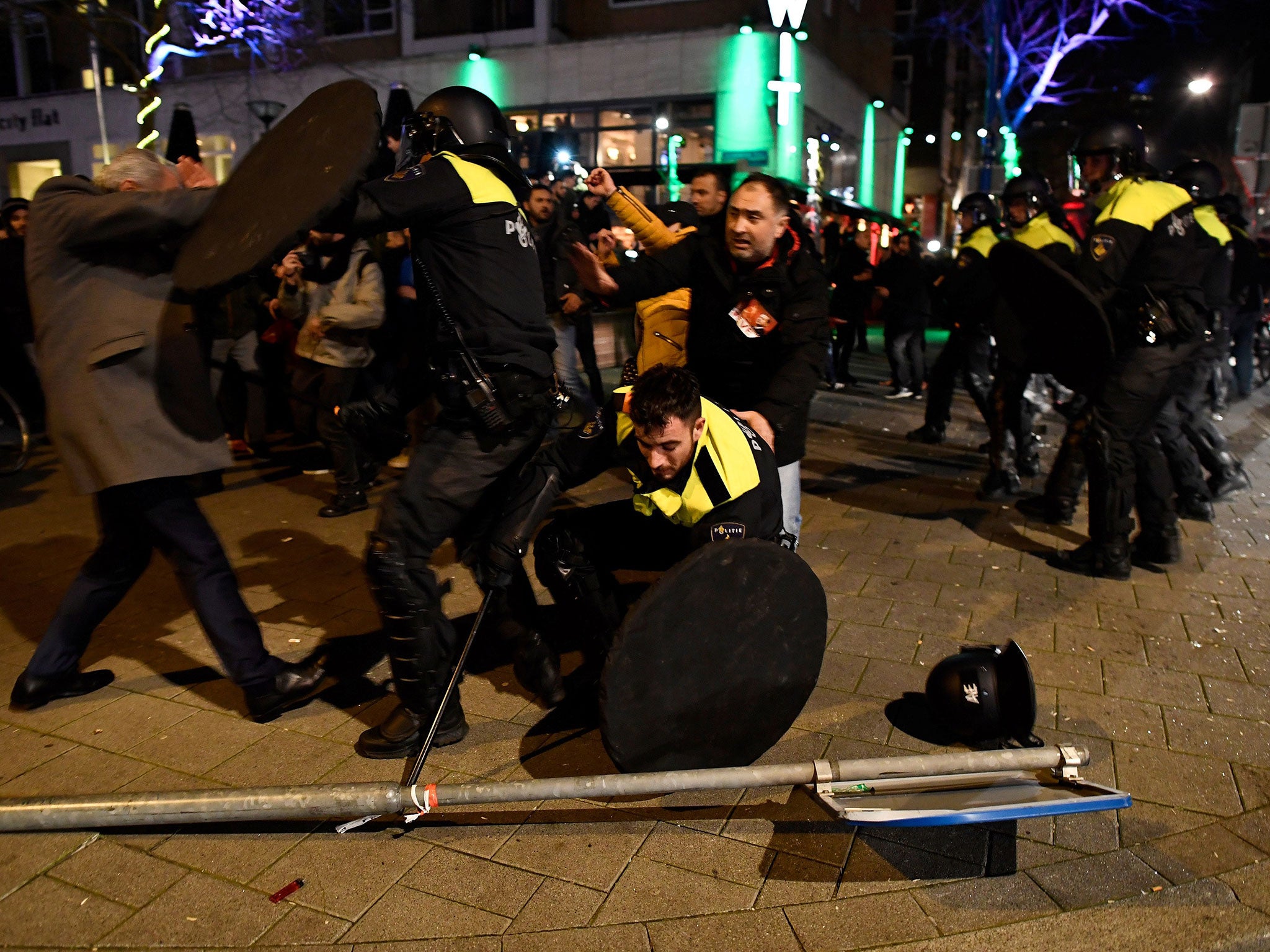 Riot police clash with demonstrators in the streets near the Turkish consulate in Rotterdam, Netherlands March 12, 2017