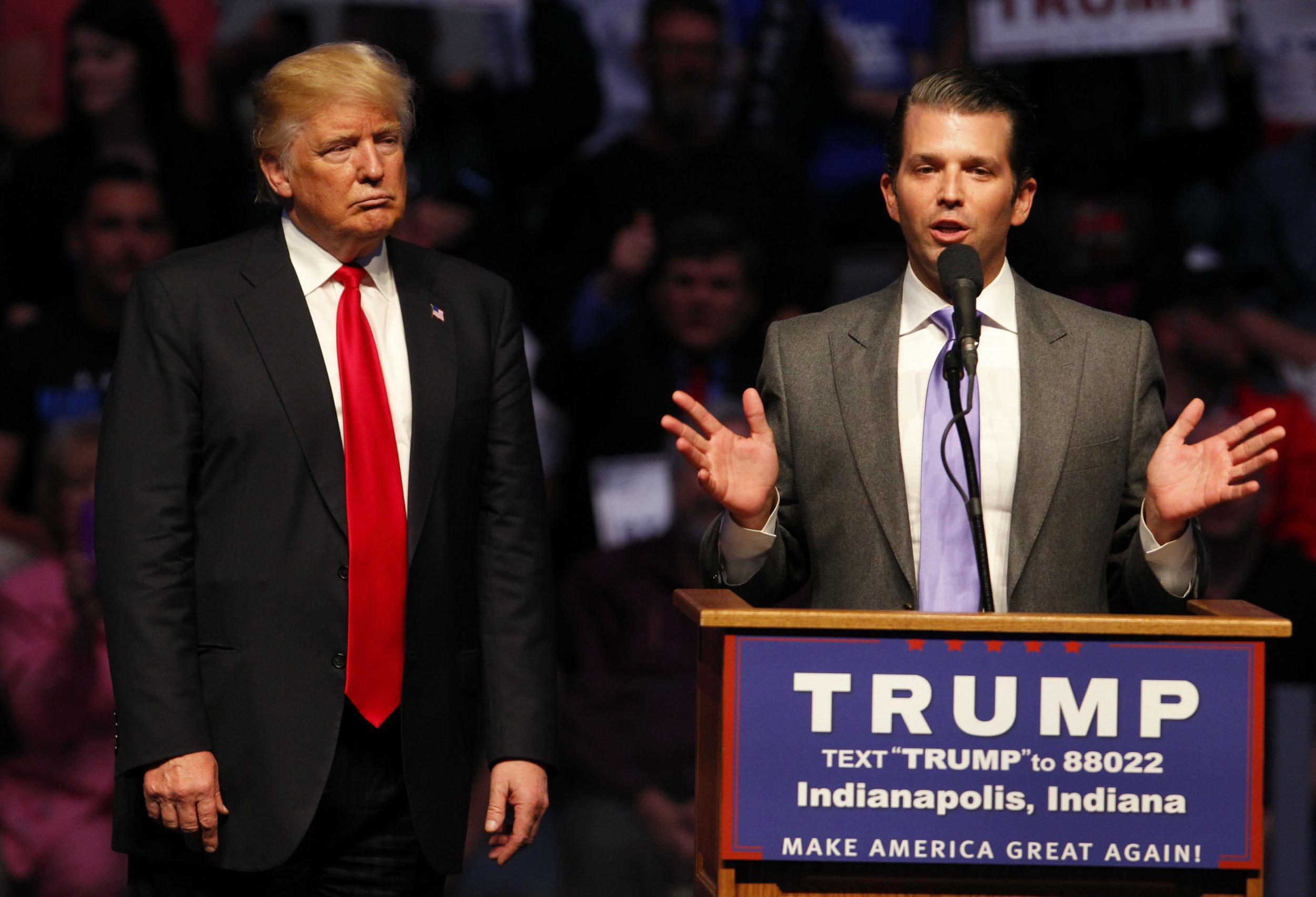 President Donald Trump with his eldest son on the campaign trail