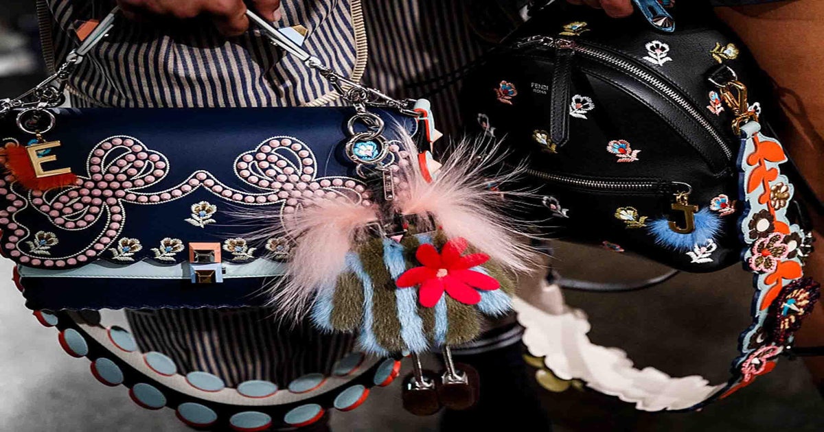 Seven Must Have Accessories for Your Handbag - Purse Bling