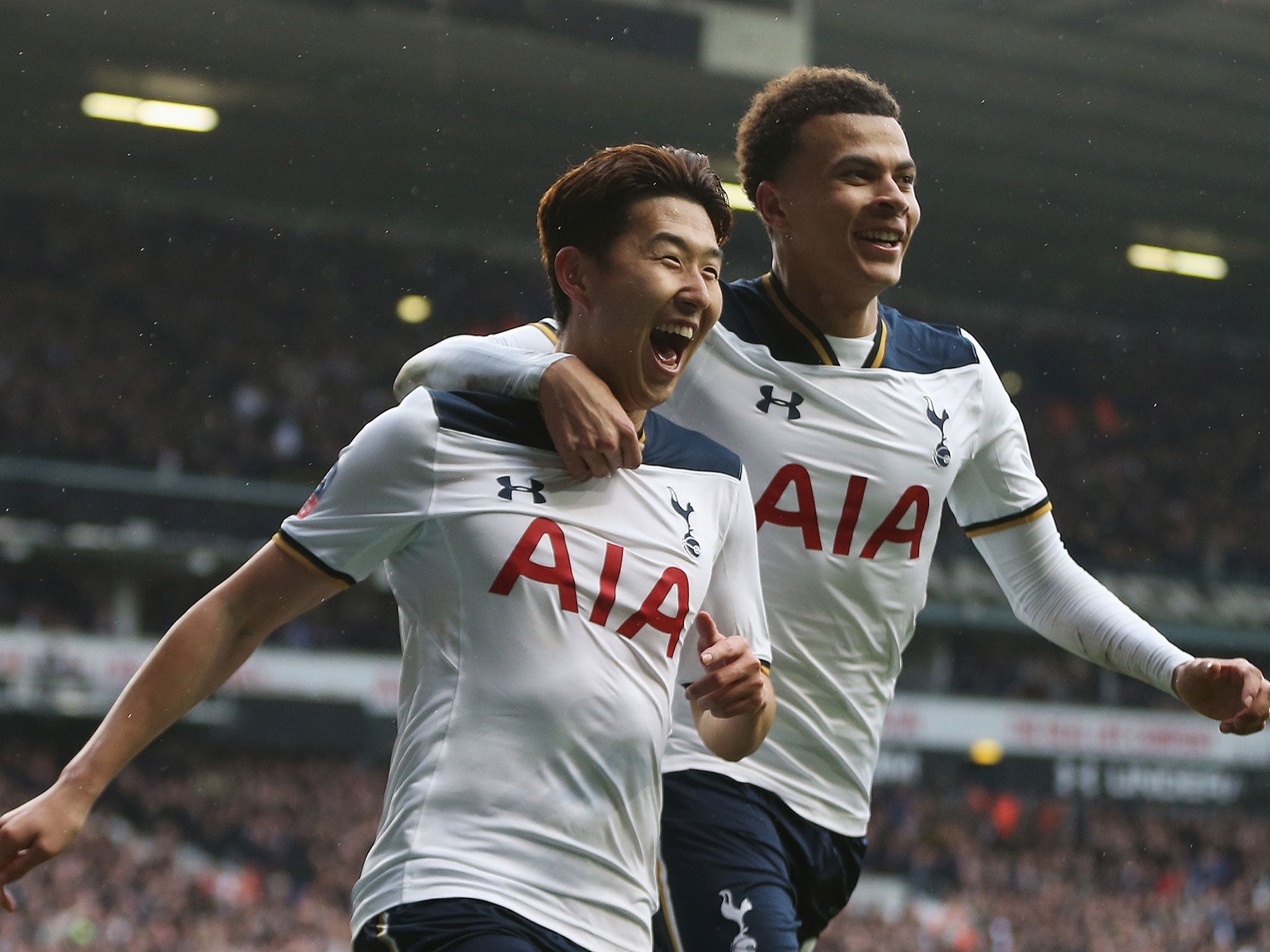 Son Heung-min celebrates with Dele Alli after scoring his second goal for Spurs against Millwall