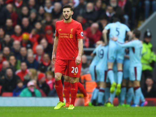 Adam Lallana reacts after Ashley Barnes scores to put Burnley ahead