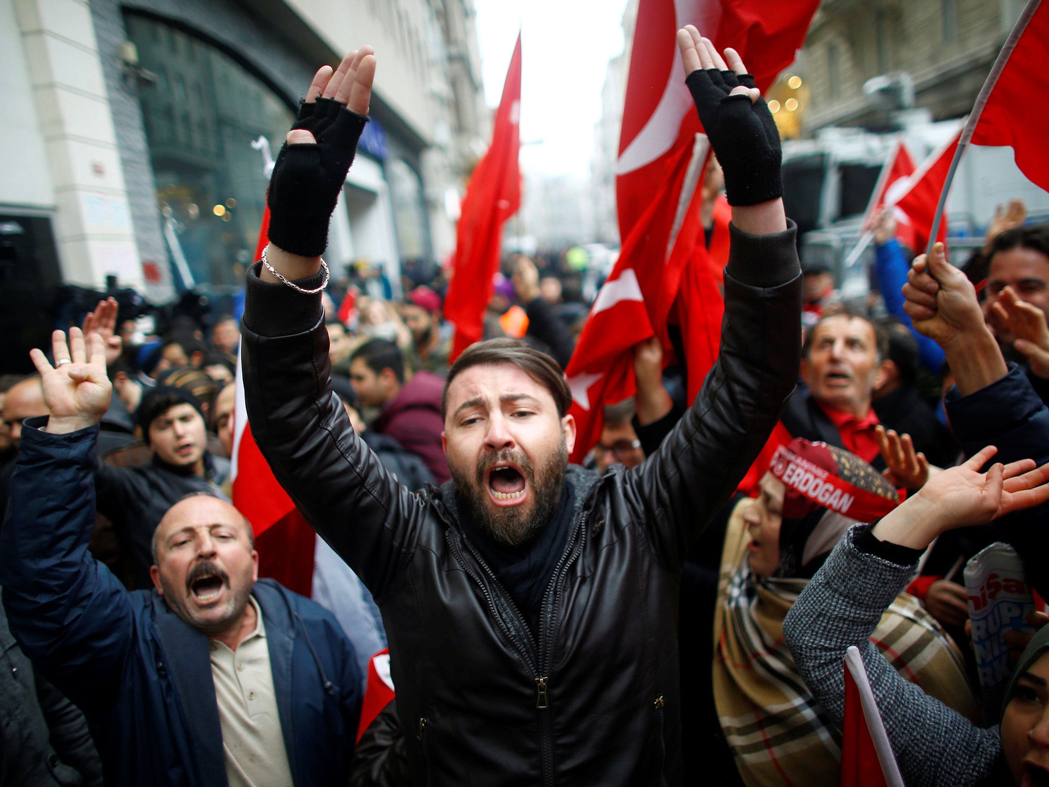 Turkish supporters of President Erdogan protest outside the Dutch Consulate in Istanbul