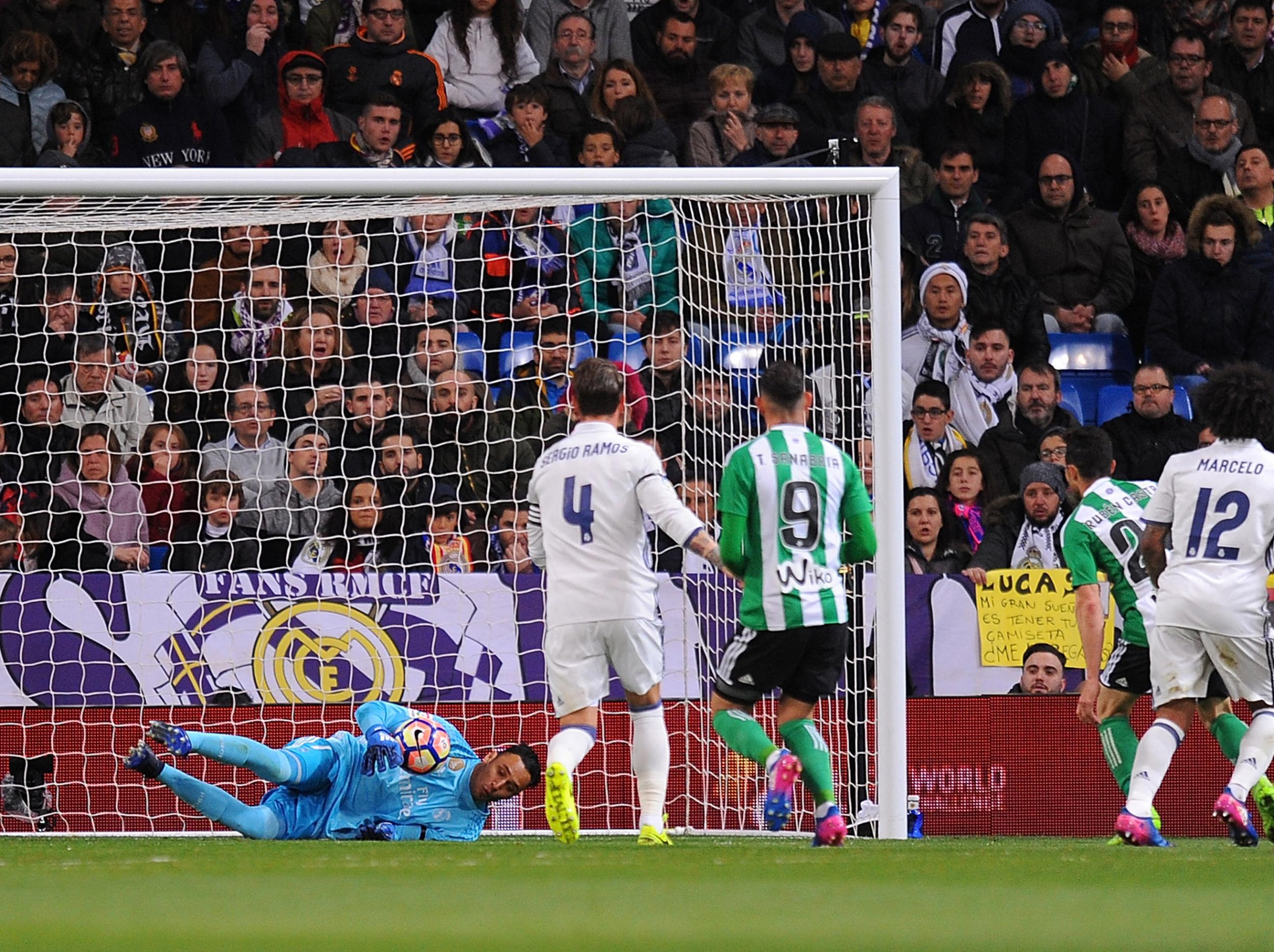 Navas let a shot squirm under his body