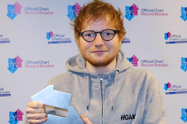 Ed Sheeran with his award