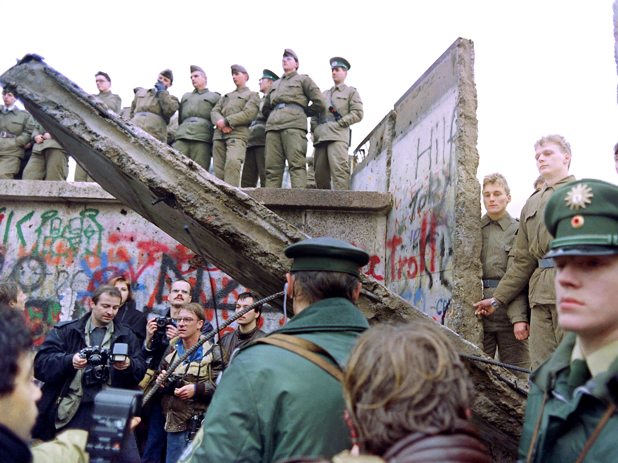 Police guard the remnants of the Berlin Wall (Getty)