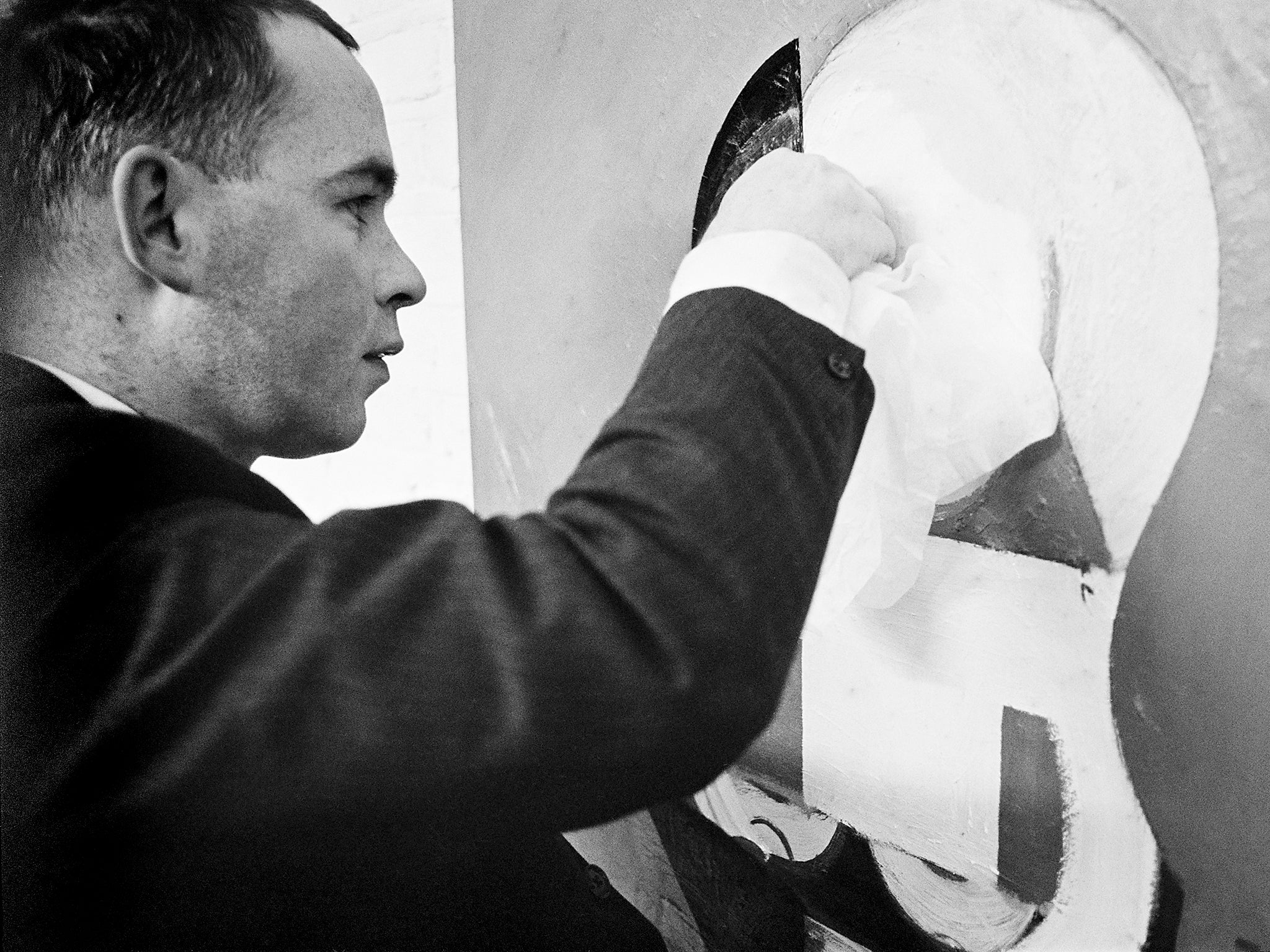 &#13;
Hodgkin in the studio in 1965: many of his paintings from this decade were portraits (Getty)&#13;