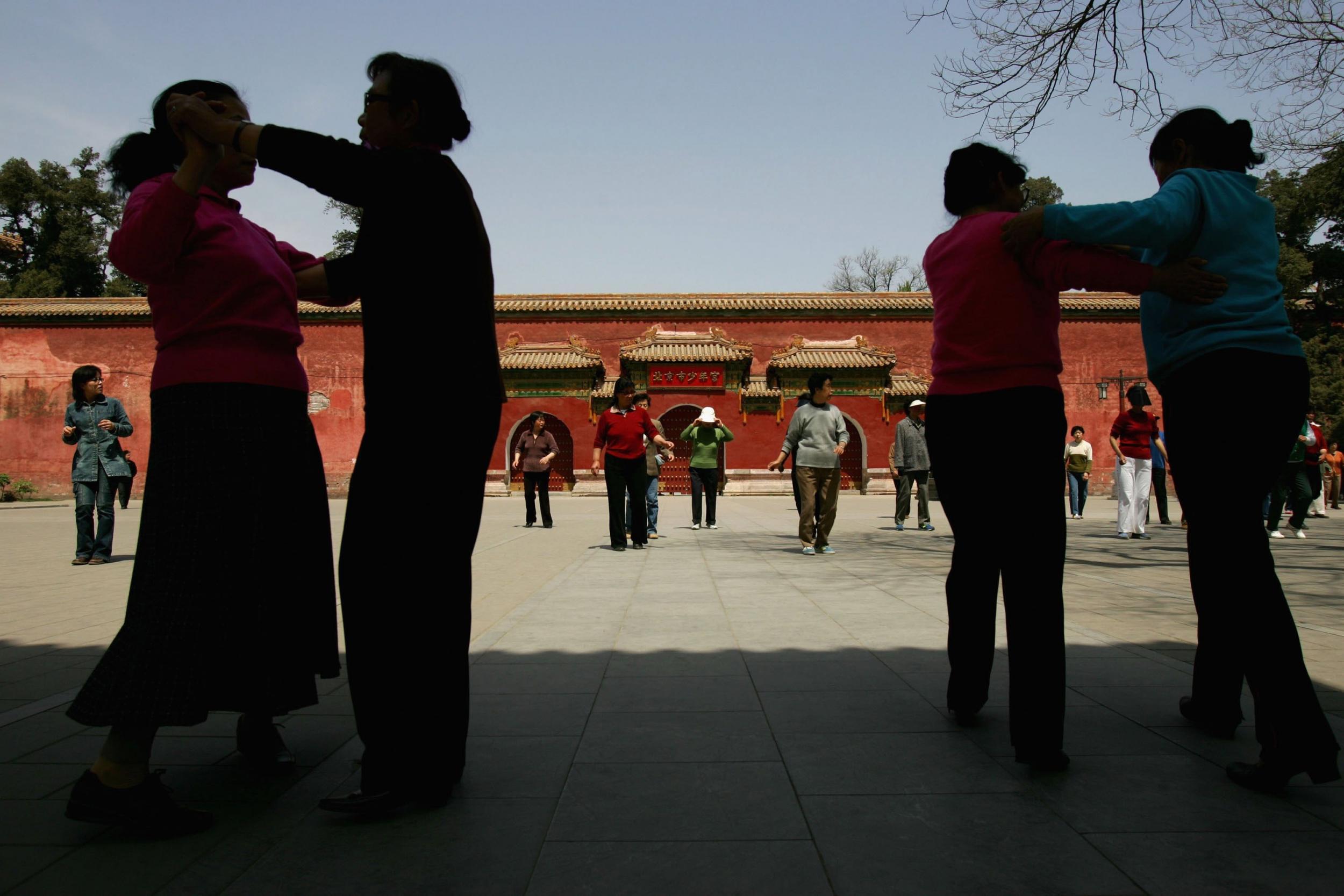Join the locals for a quick dance in Jingshan Park