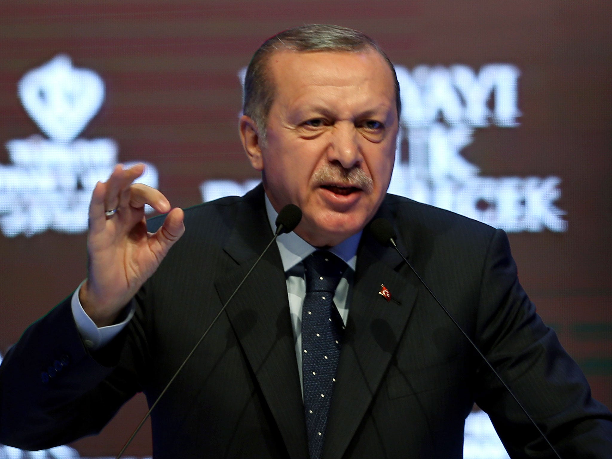 Turkey's President Recep Tayyip Erdogan talks during a rally in Istanbul, Sunday, 12 March 2017