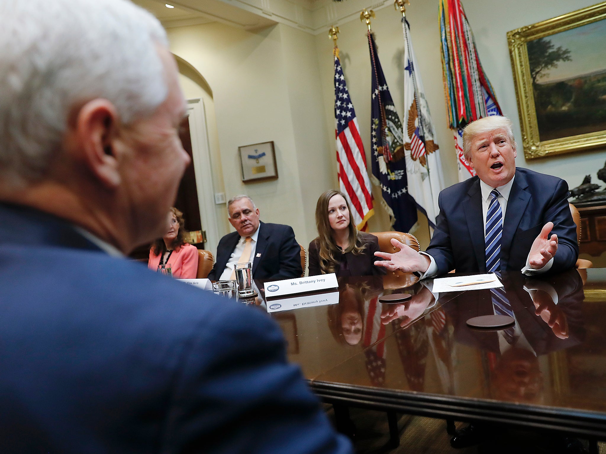 President Donald Trump and Vice President Mike Pence, left, participate in a meeting on healthcare in the Roosevelt Room of the White House in Washington