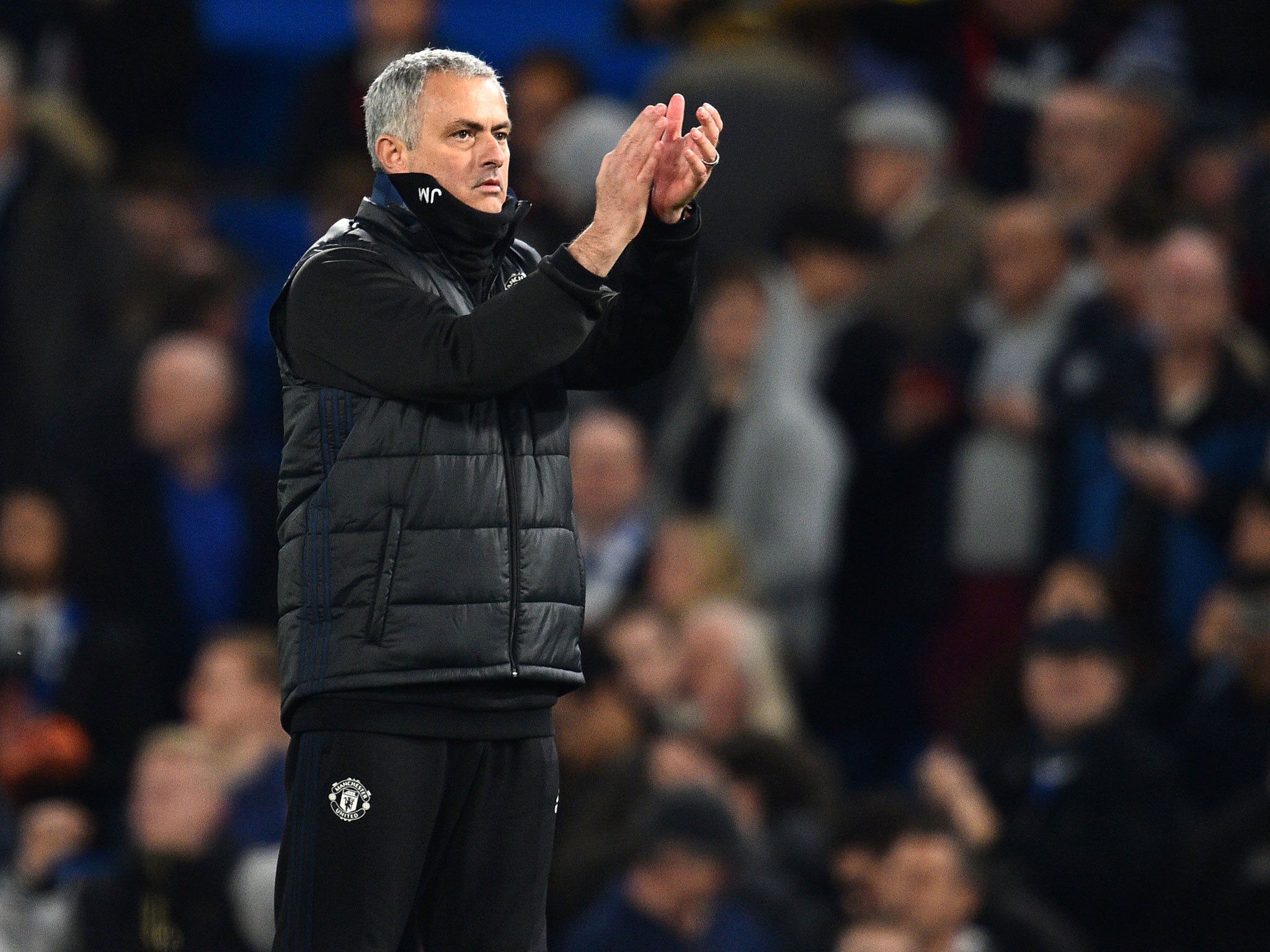 Mourinho applauds United's fans after the final whistle