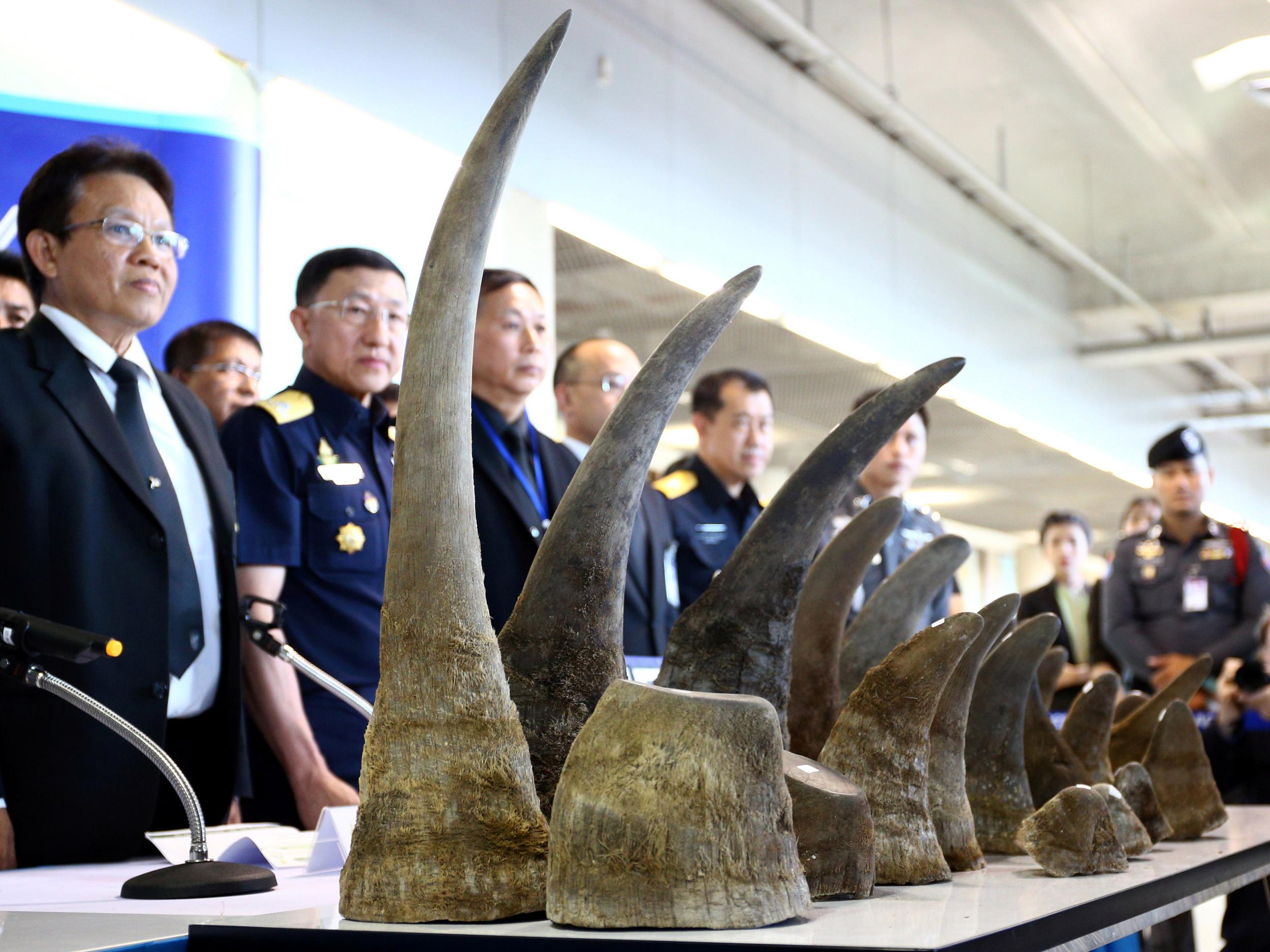 Rhino horns are displayed during a news conference at the Suvarnabhumi International Airport in Bangkok