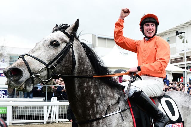 Jack Kennedy on board Labaik celebrates after winning the Sky Bet Supreme Novices Hurdle during Champion Day of the Cheltenham Festival