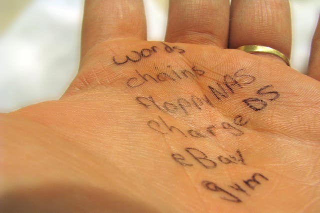 Written list on palm of hand