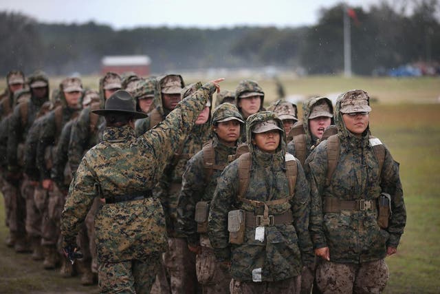 Female Marine attend boot camp at MCRD Parris Island, South Carolina on February 25, 2013.