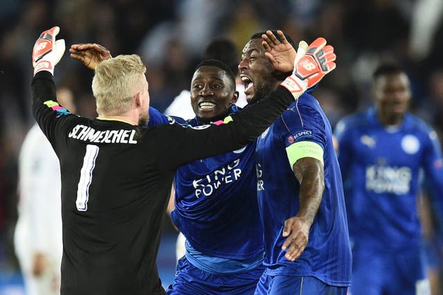 Leicester's players celebrate at the final whistle