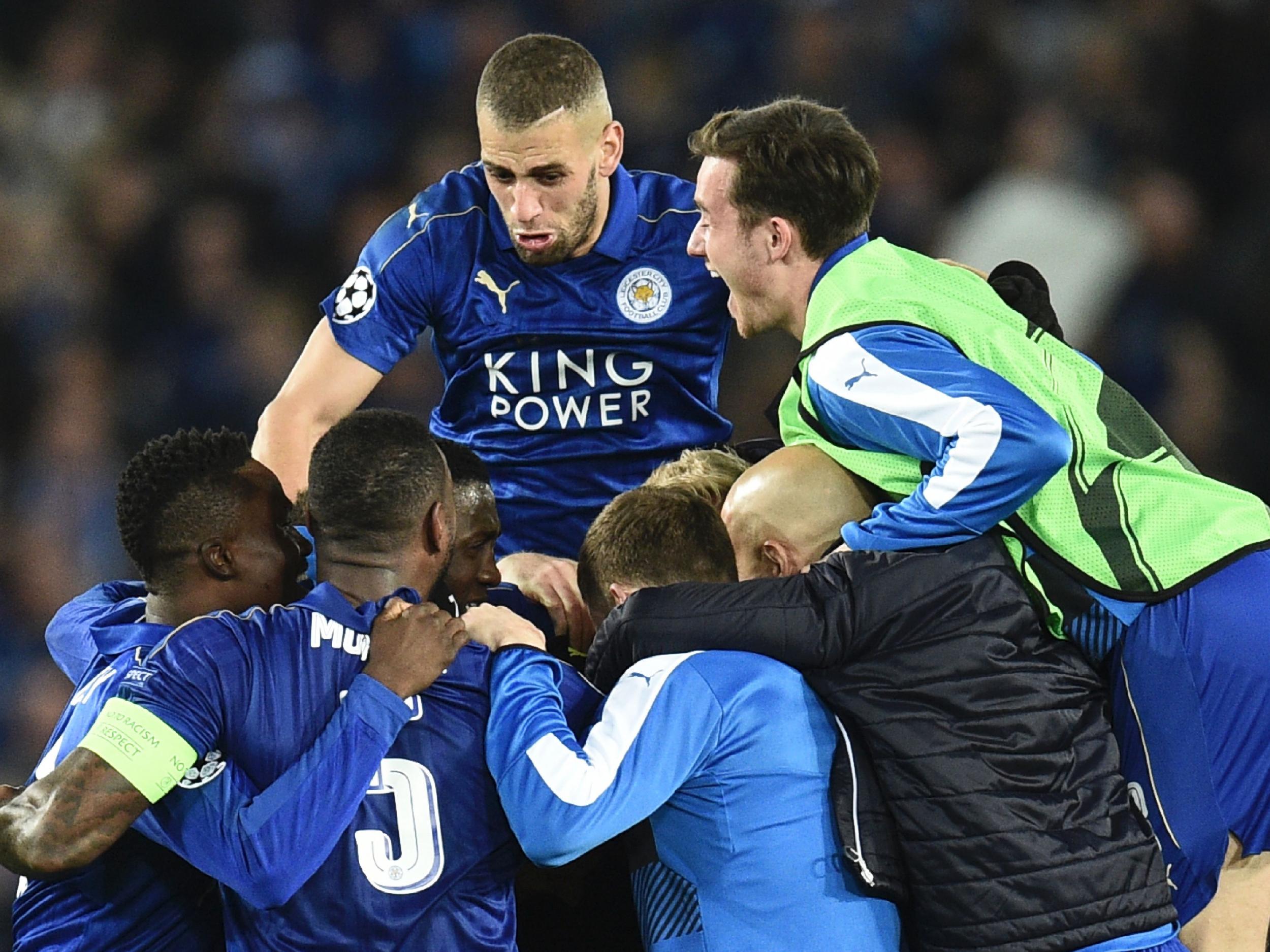 Leicester's players celebrate after the final whistle