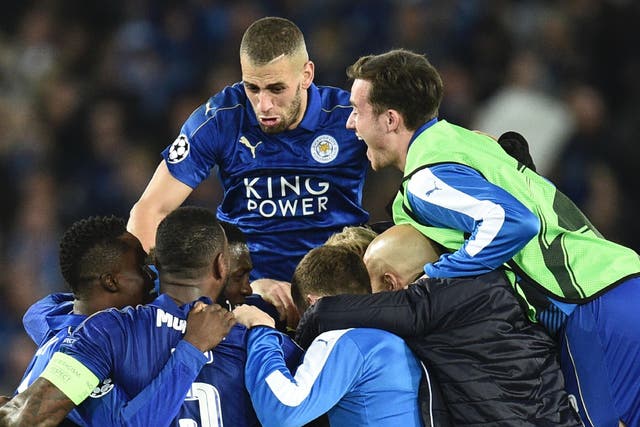 Leicester's players celebrate after the final whistle
