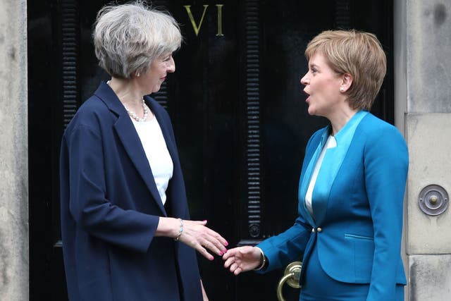 Theresa May and Nicola Sturgeon are clashing over Scotland's referendum date
