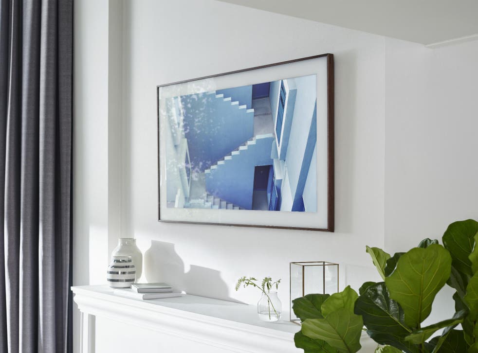 The Frame Samsung S New 4k Tv Transforms Into Wall Art Independent - How To Frame Tv On Wall