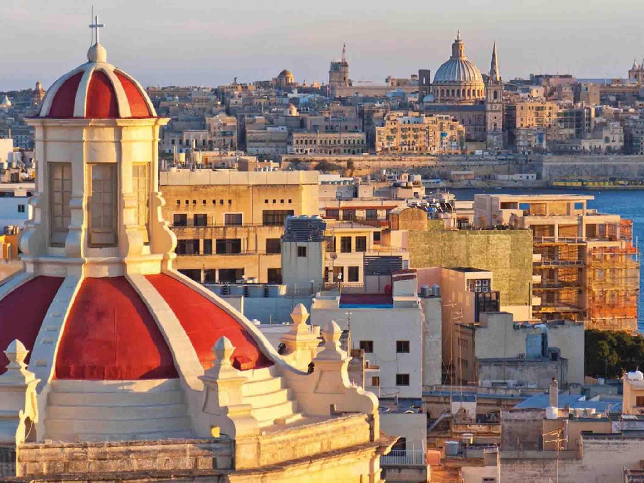 Red-top: the dome of Our Lady of Liesse with a view of Valletta’s Mount Carmel church
