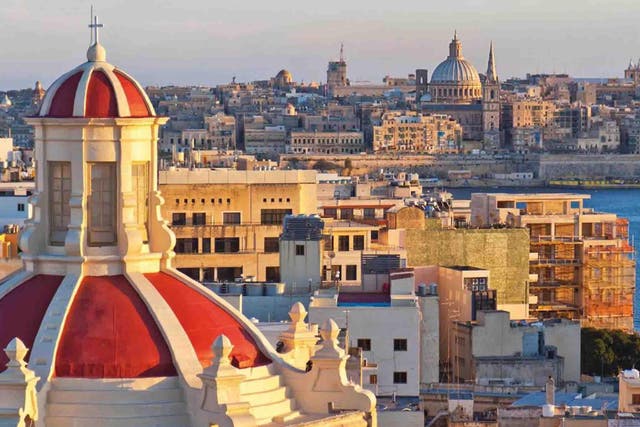 Red-top: the dome of Our Lady of Liesse with a view of Valletta’s Mount Carmel church 