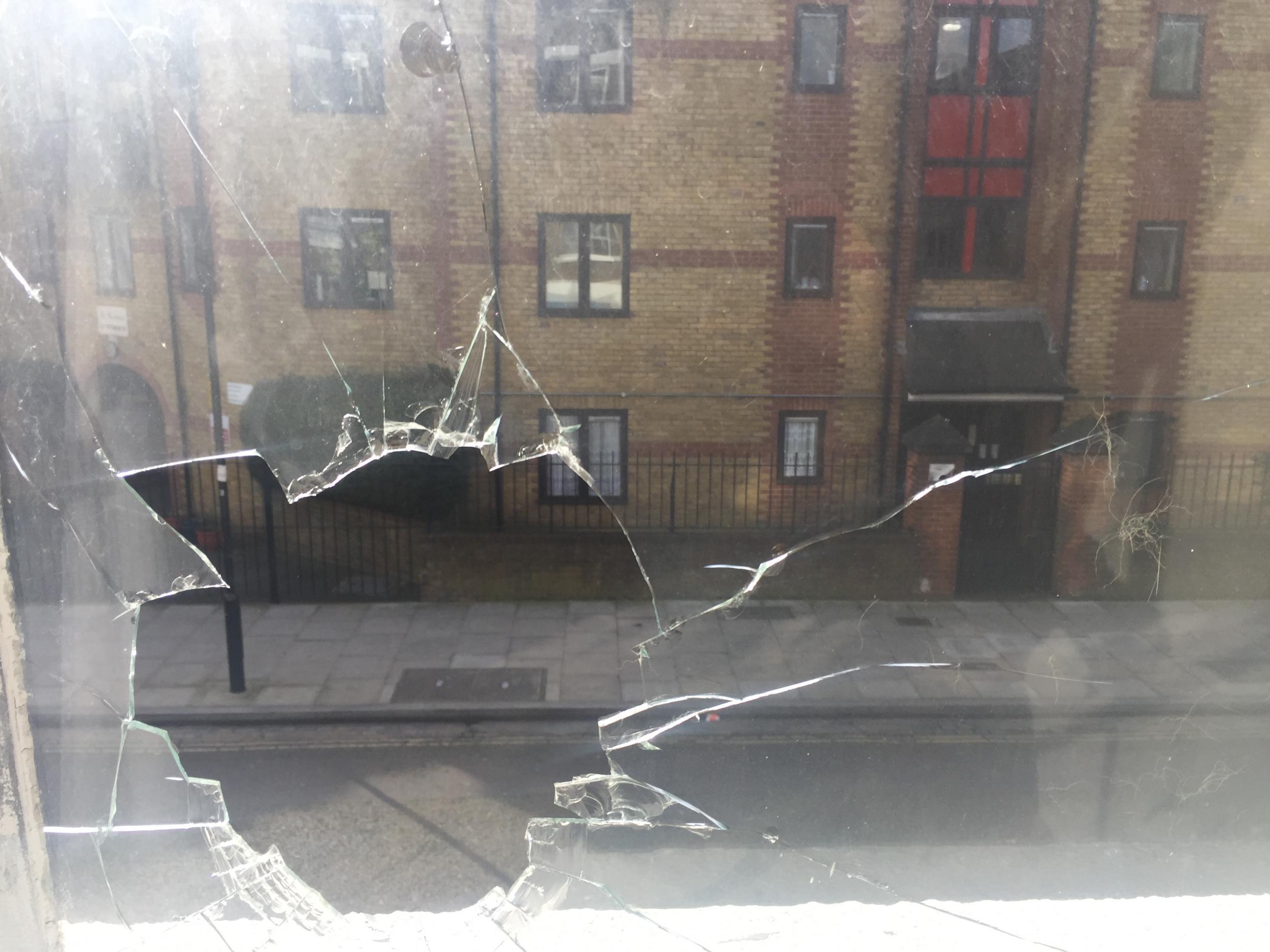 Photographs supplied by Ms Diego purportedly showing a smashed window from inside the gallery