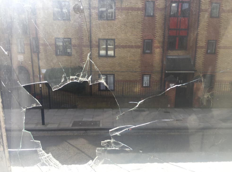 Photographs supplied by Ms Diego purportedly showing a smashed window from inside the gallery