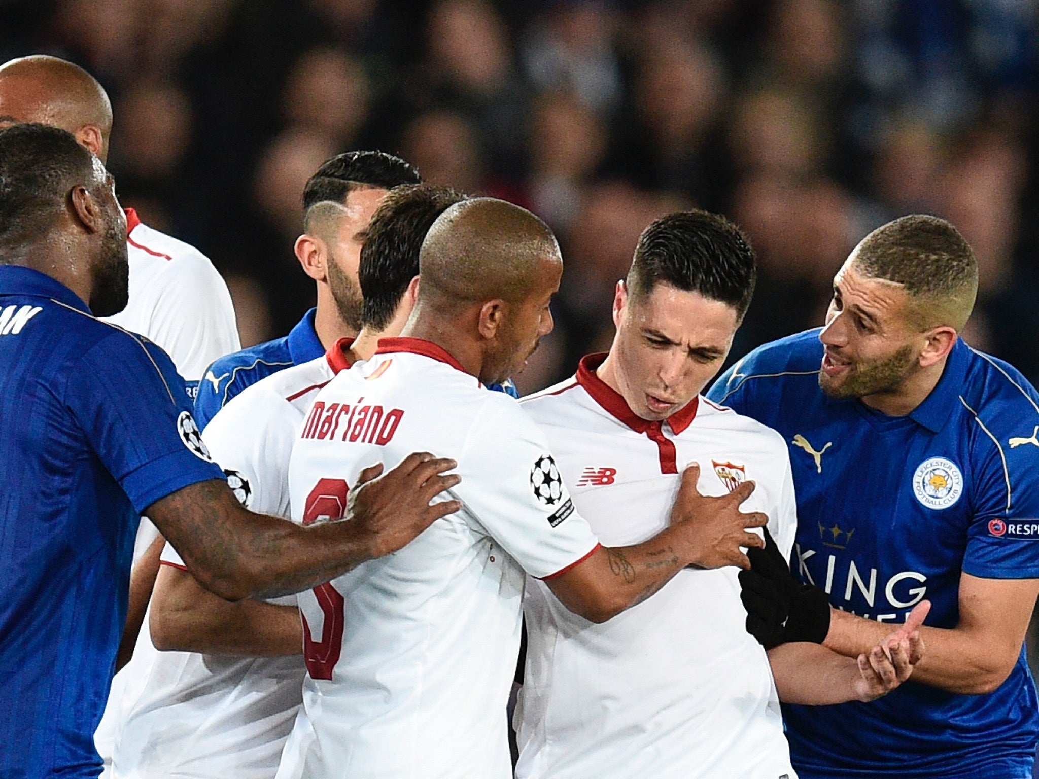 Nasri had to be shepherded away from the pitch by his team-mates