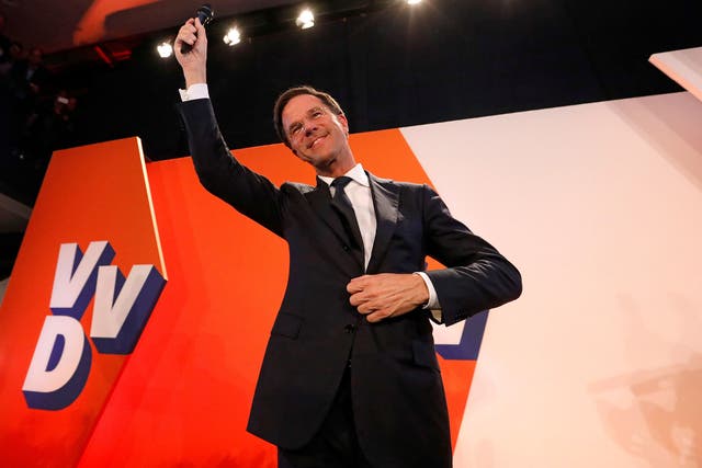 Dutch Prime Minister Mark Rutte of the VVD party appears before his supporters in The Hague