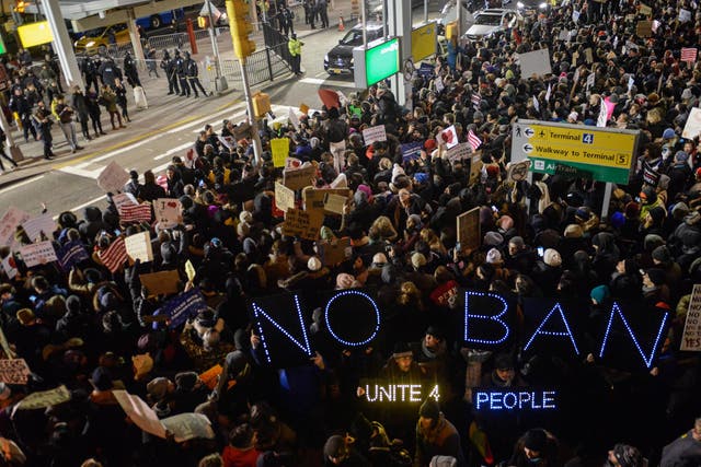 A demonstration against Donald Trump's immigration ban at John F Kennedy International Airport on 28 January