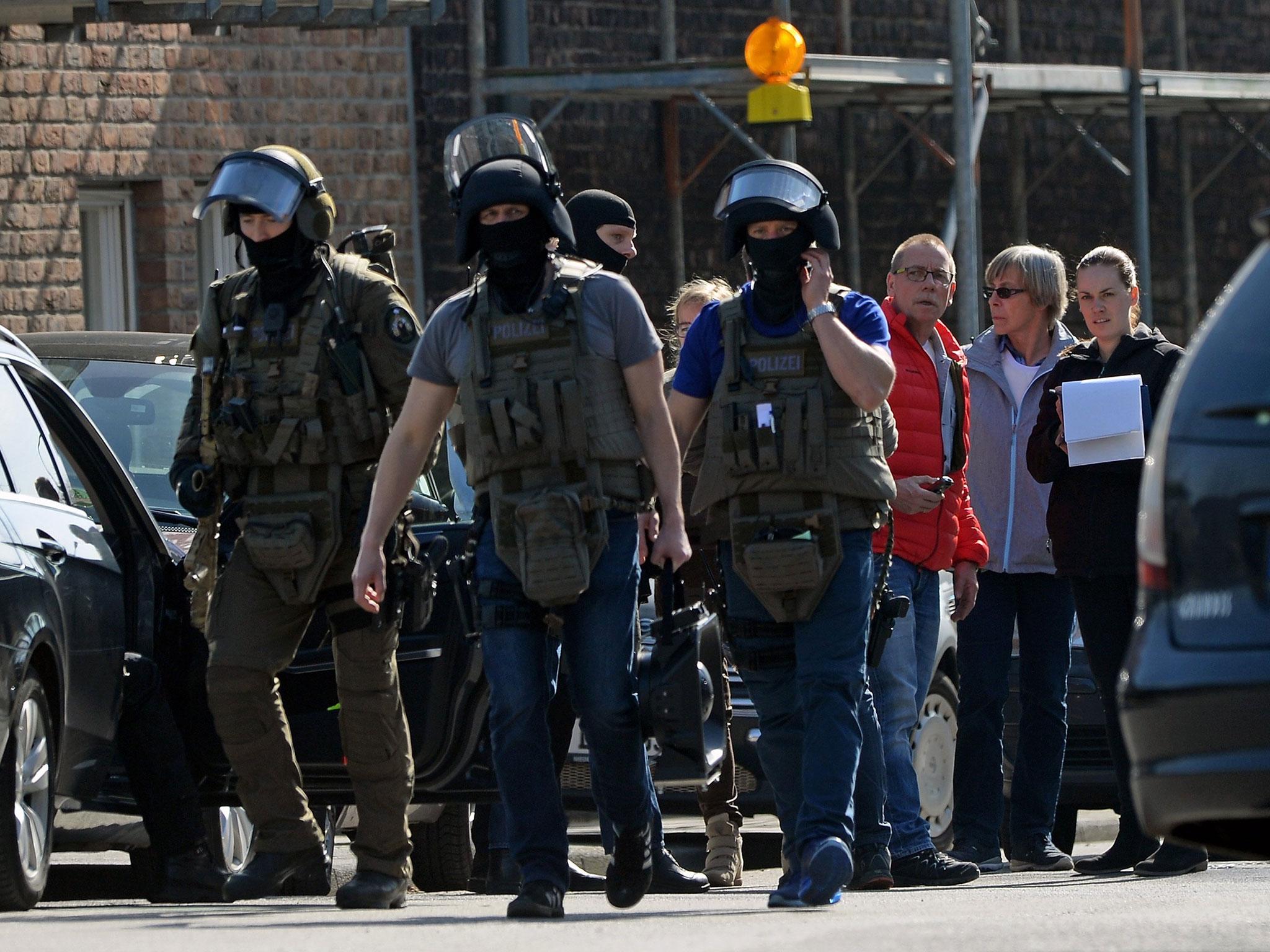 Police officers secure the area around the bank