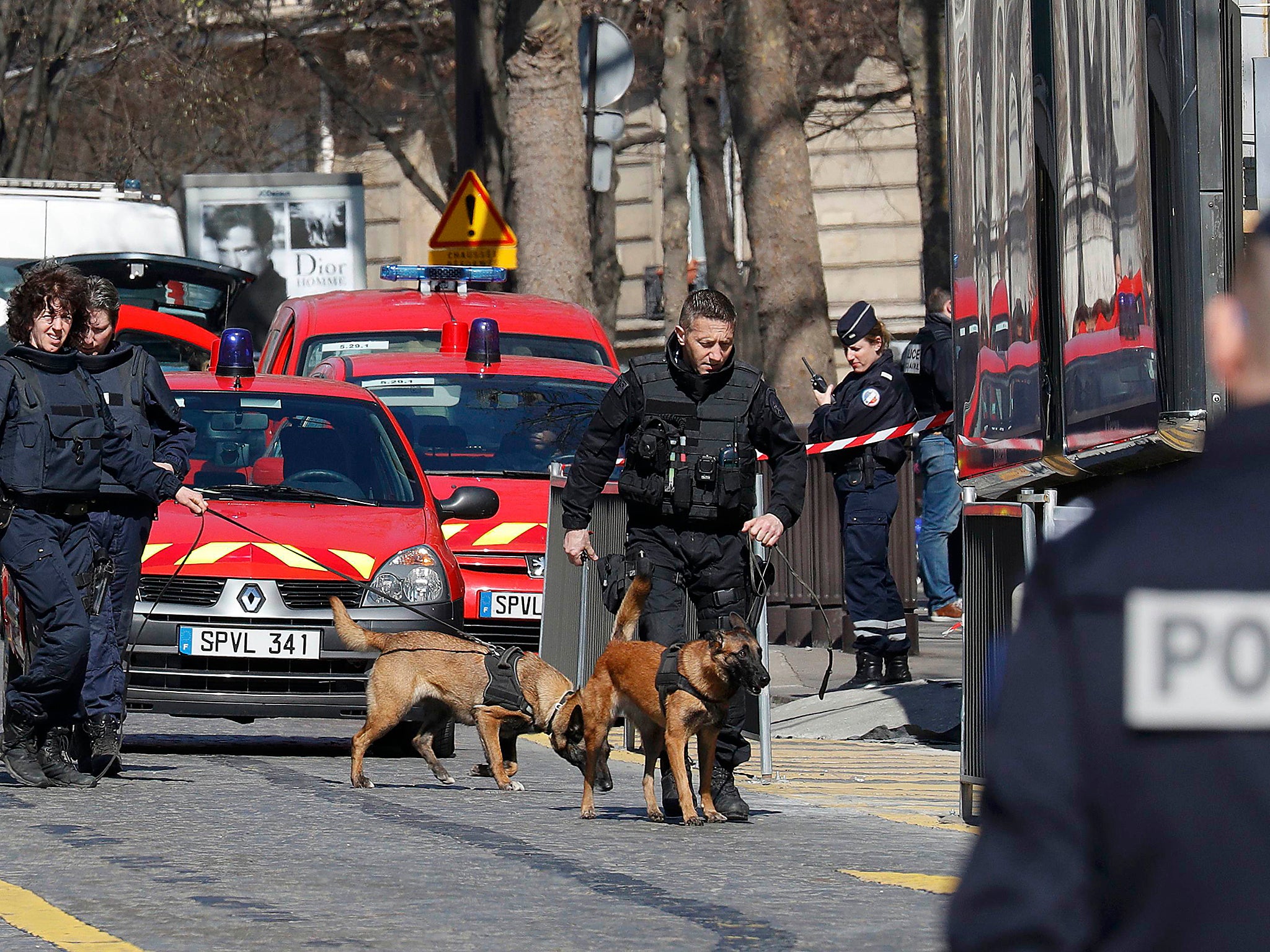 Police outside the International Monetary Fund (IMF) offices where an envelope exploded in Paris, France