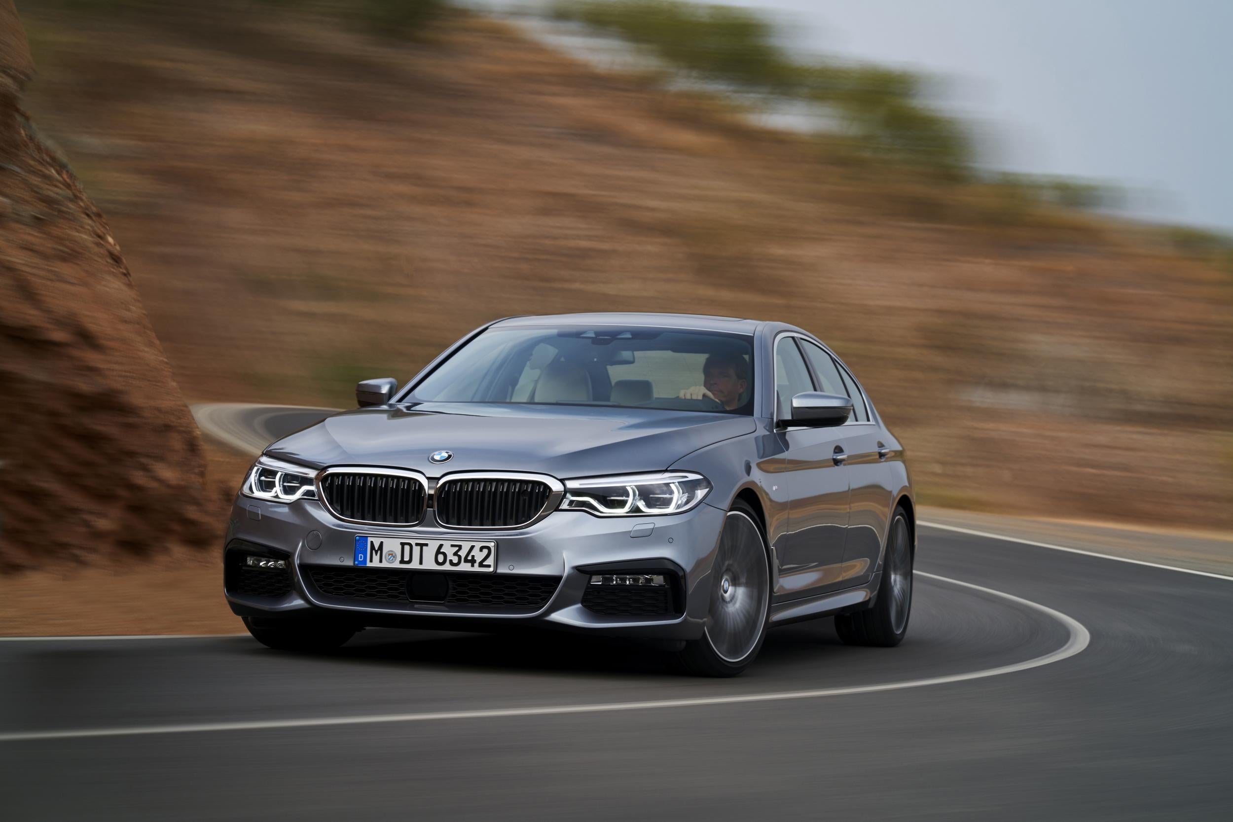 Corner-hugging: the new BMW 5 Series offers adaptable cruise control, a lane-recognition system and self-parking