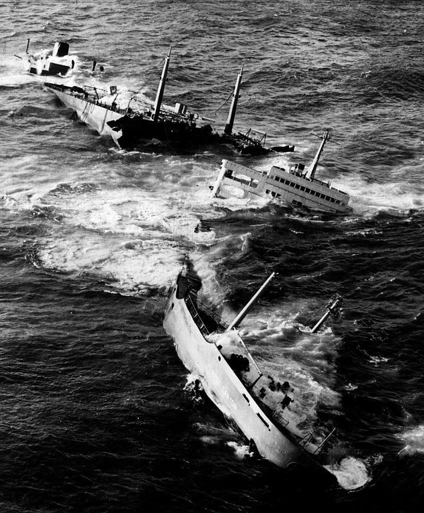 The wrecked tanker Torrey Canyon being broken apart by pounding seas, after she ran aground on Seven Stones Reef, off Lands End, Cornwall