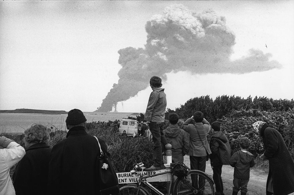 People at Land’s End, Cornwall watch the bombing of the stricken tanker