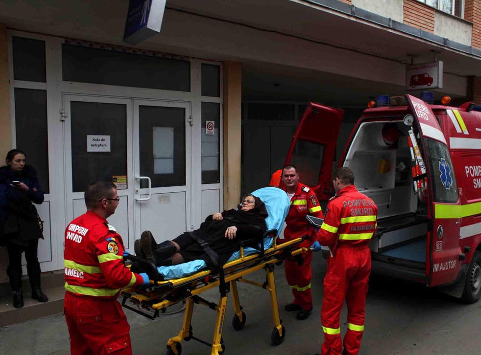 Doctors who are part of the emergency rescue service bring a patient to the Emergency Unit in Cluj-Napoca, Romania