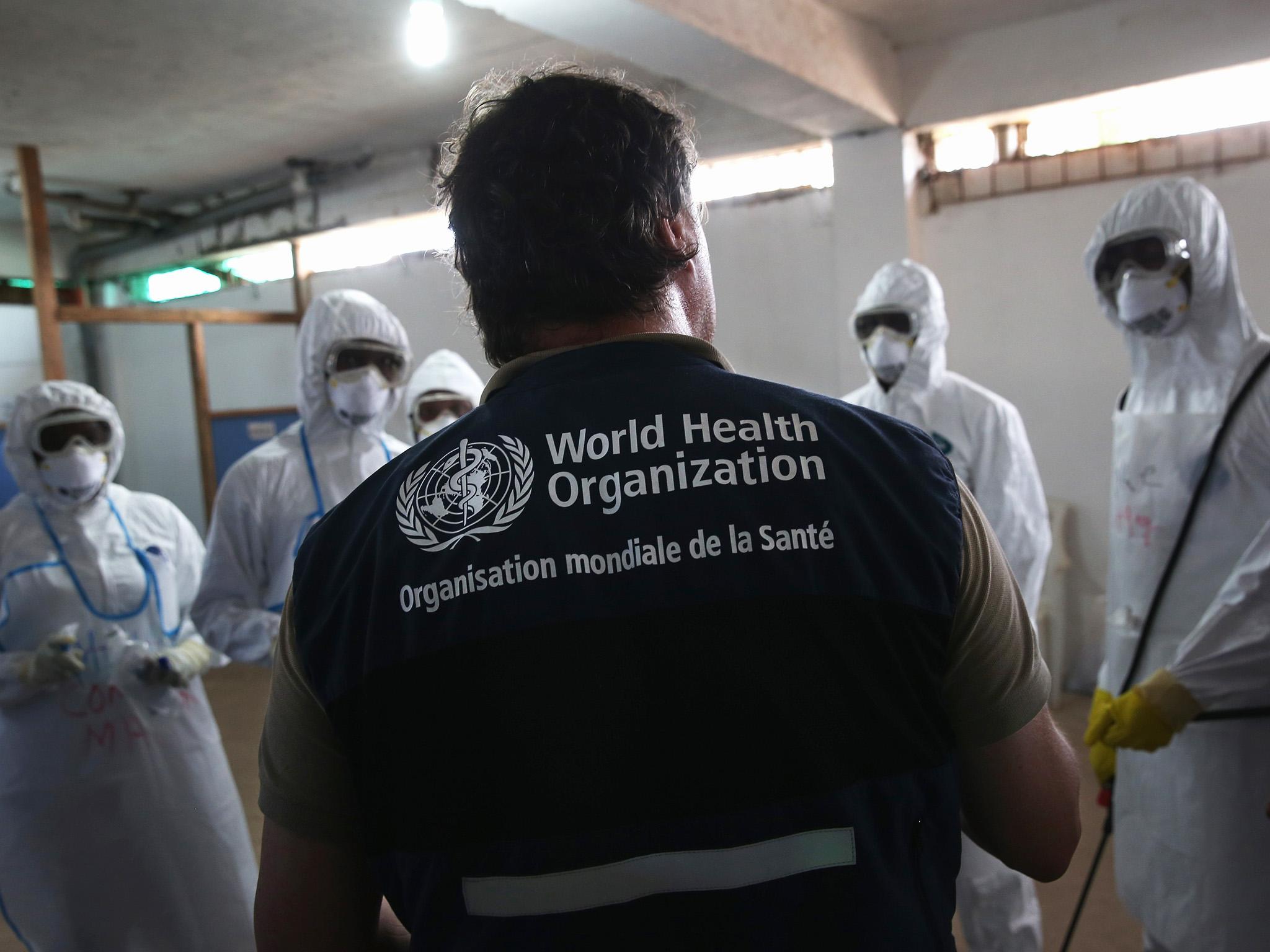 A health worker leads a training session at an Ebola treatment unit in Liberia in 2014