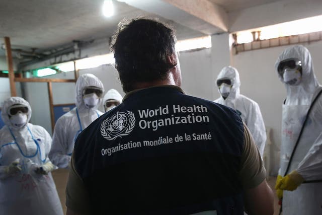 A health worker leads a training session at an Ebola treatment unit in Liberia in 2014