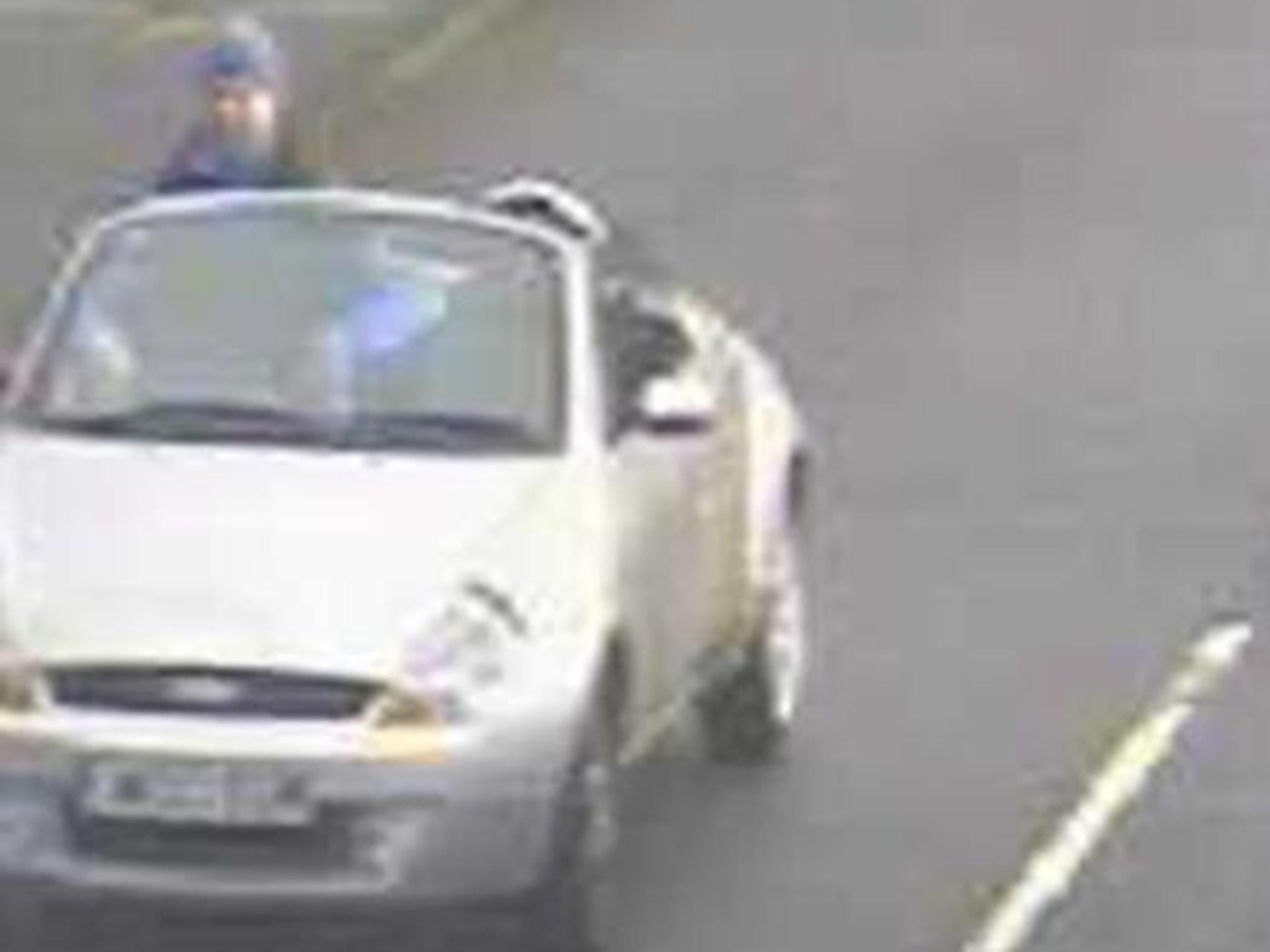 CCTV showing Adam Elliott driving the car while standing up